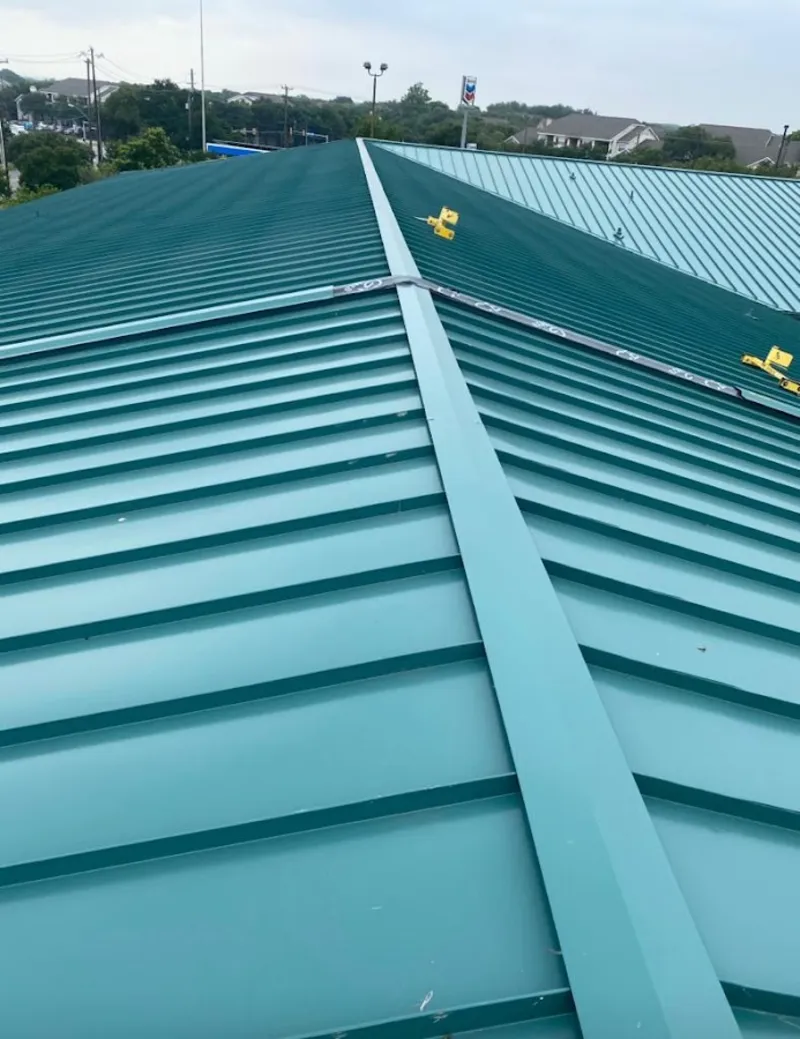 Green commercial metal roof ridge and valley for Metal Roof Repair in Ridley Park