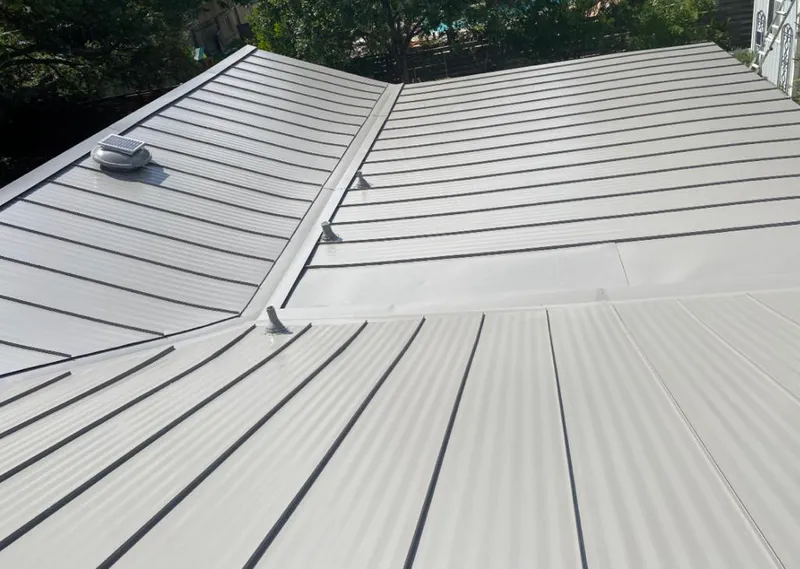 Solar attic fan installed on a metal roof for Roof Ventilation in Ridley Park