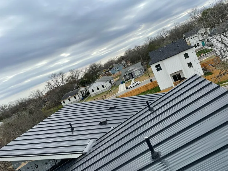 Standing seam metal roof panels with vents for Skylight Repair in Ridley Park